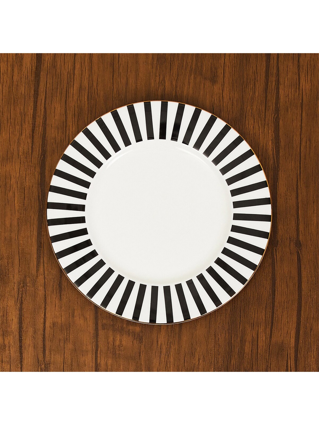 

Home Centre White & Black 1 Pieces Printed Bone China Glossy Plates