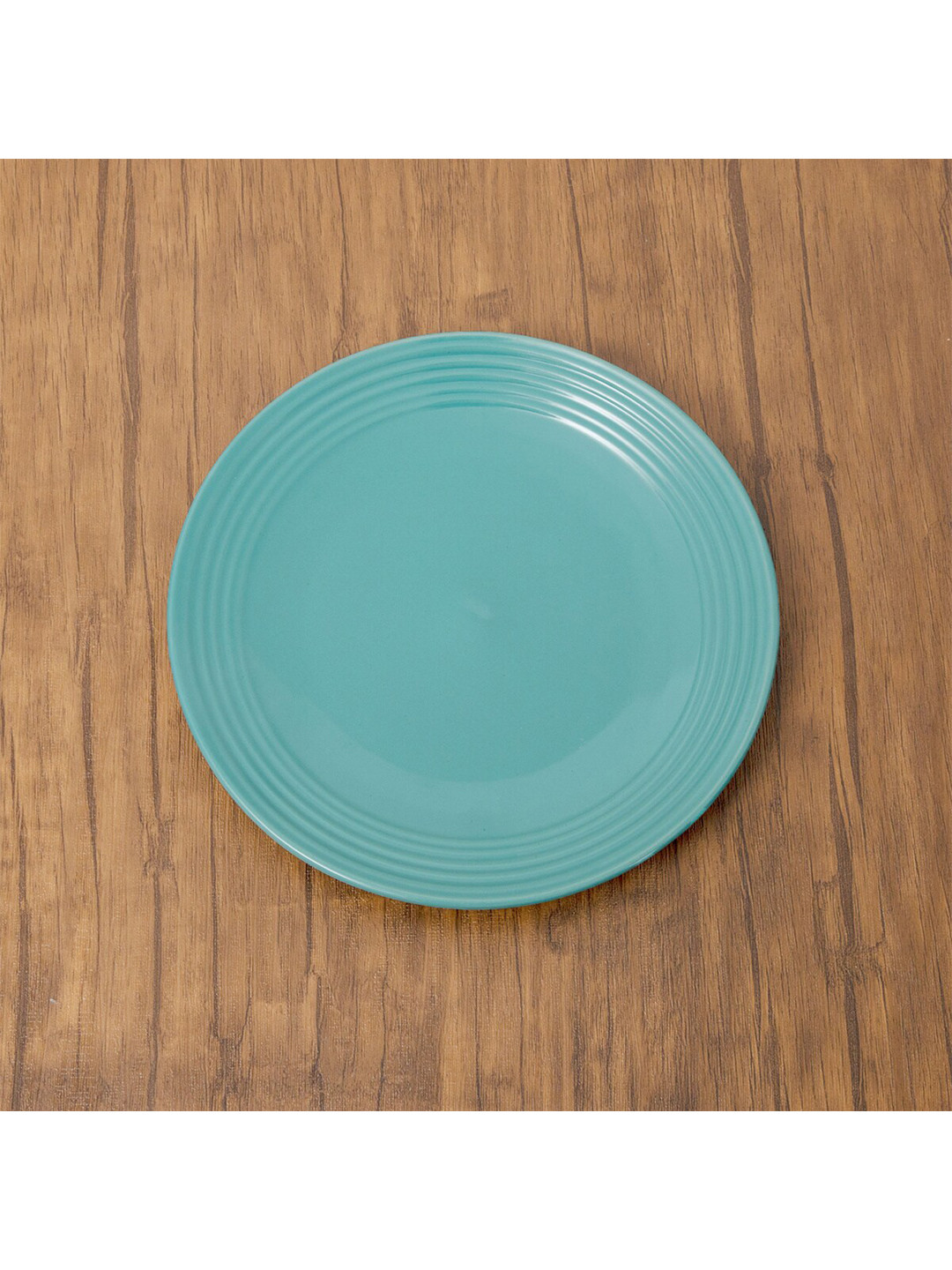 

Home Centre Blue Textured Stoneware Glossy Plates