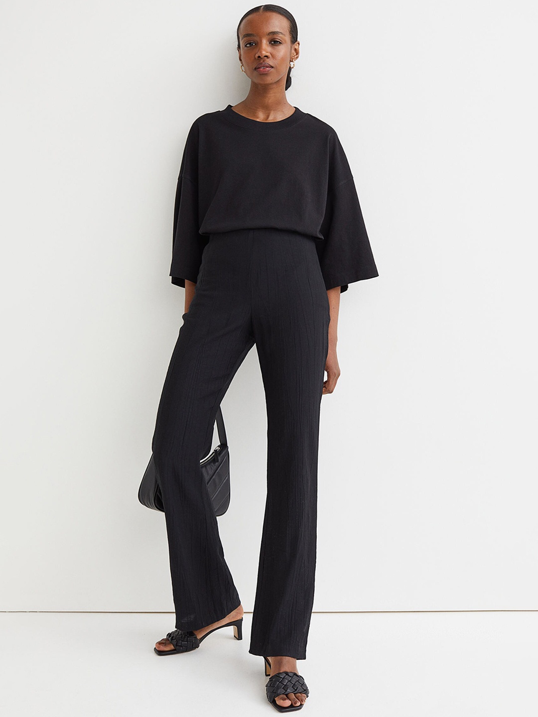 

H&M Women Black Flared Trousers