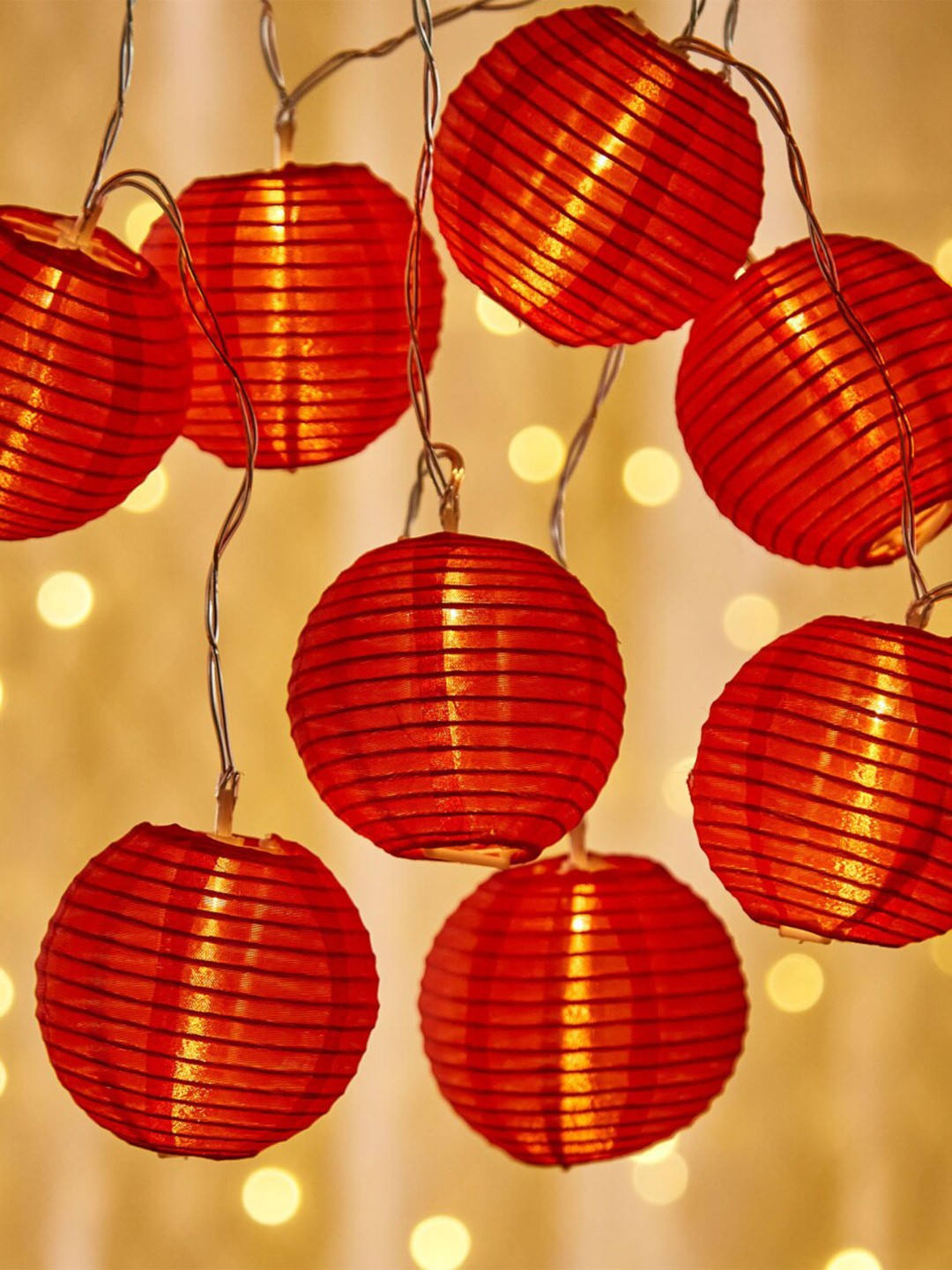 

Home Centre Set Of 10 Red Textured Cotton LED Lantern Shaped String Light