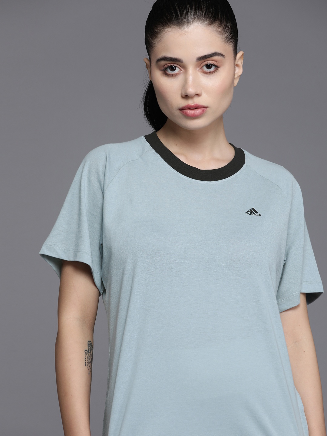 

ADIDAS Women Grey With A Tinge Of Blue Solid T-shirt