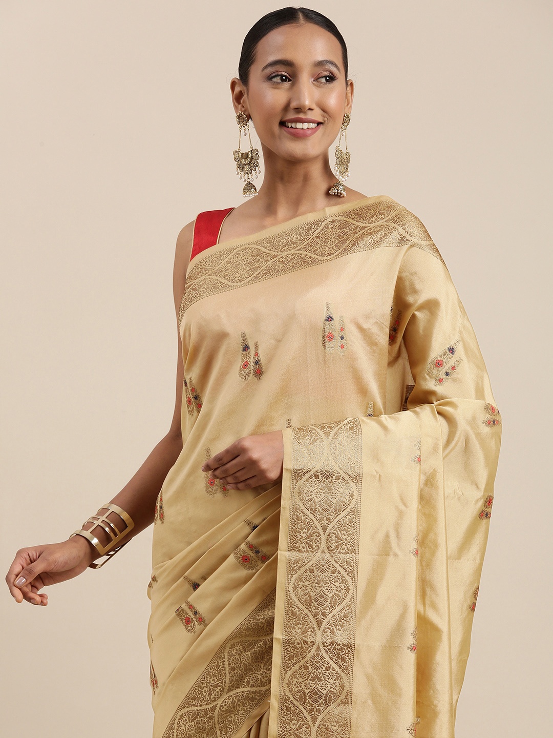

Shaily Beige & Red Ethnic Motifs Zari Woven Design Saree