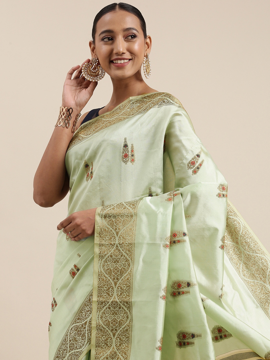 

Mitera Sea Green Ethnic Motifs Zari Woven Design Saree