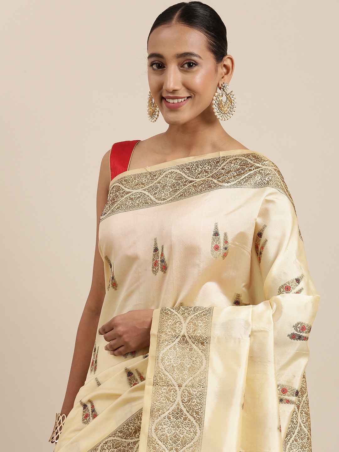 

Mitera Cream-Coloured Ethnic Motifs Zari Woven Design Saree