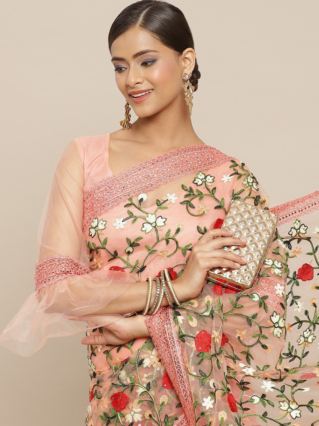 

RAJGRANTH Pink & Green Ethnic Motifs Beads and Stones Net Heavy Work Saree