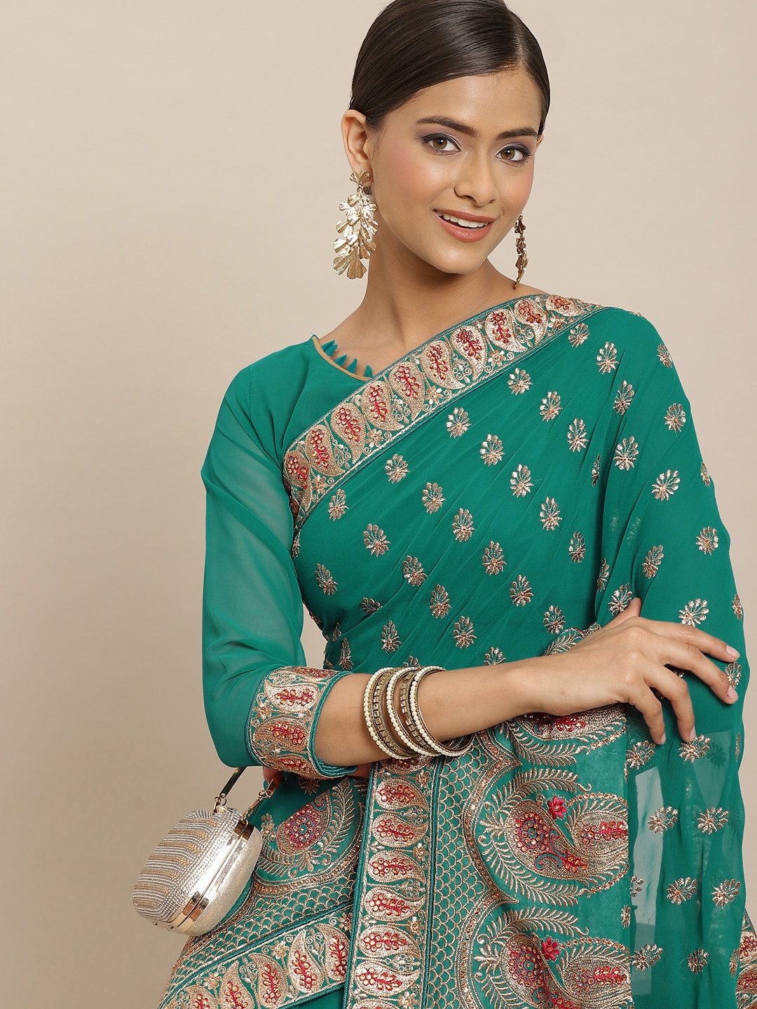 

RAJGRANTH Turquoise Blue & Golden Ethnic Motifs Pure Georgette Heavy Work Saree
