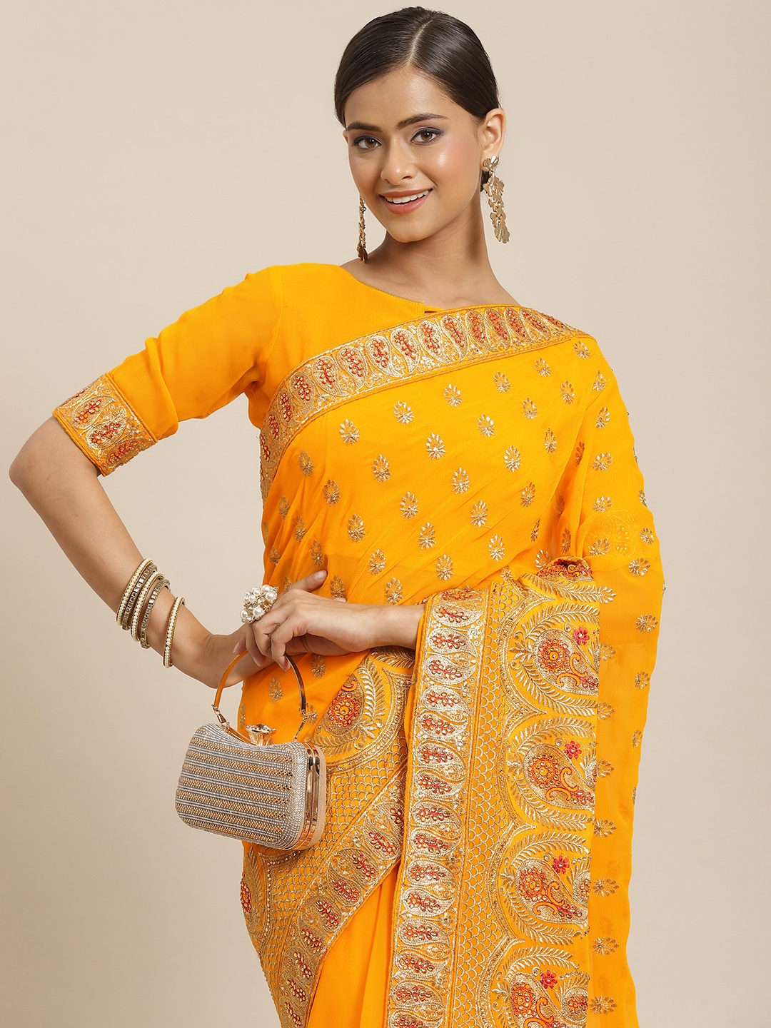 

RAJGRANTH Yellow & Golden Ethnic Motifs Beads and Stones Pure Georgette Heavy Work Saree