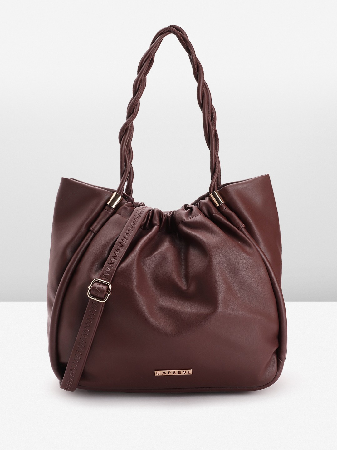 

Caprese Women Solid Shoulder Bag, Brown