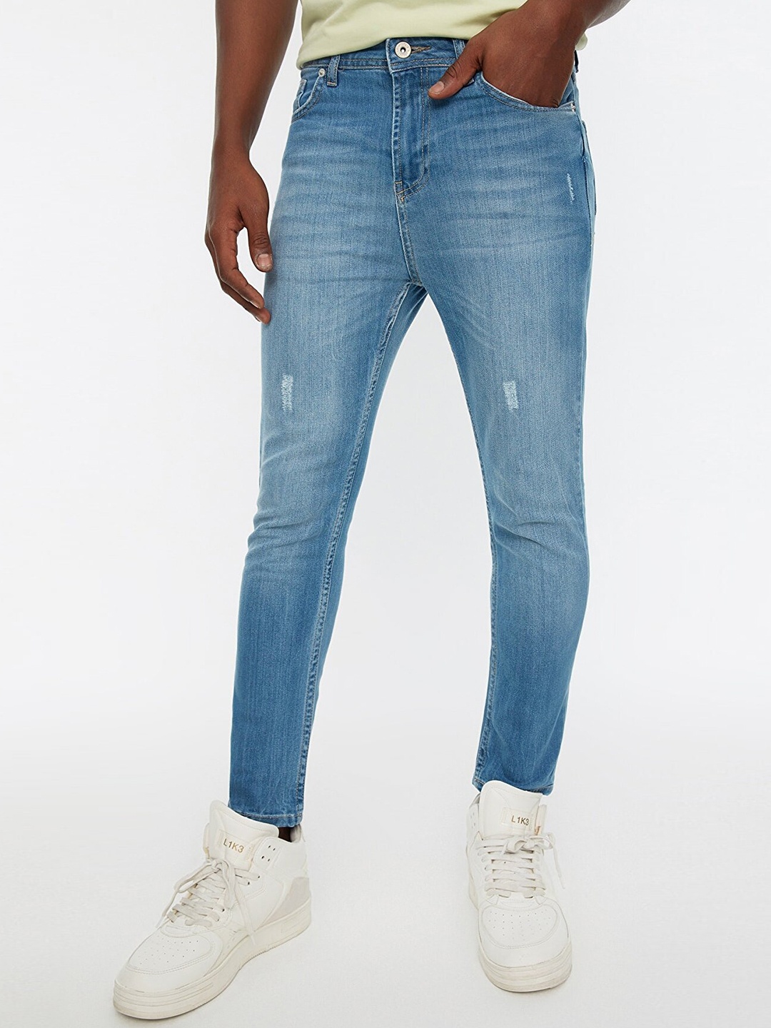 

Trendyol Men Blue Skinny Fit Low Distress Light Fade Stretchable Cropped Jeans