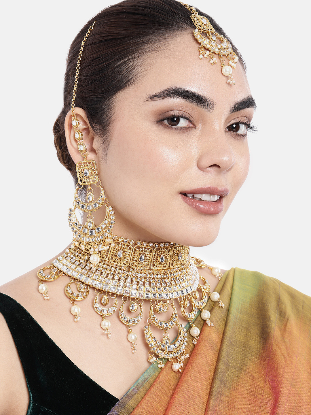 

Peora Off-White Gold-Plated Kundan Studded & Beaded Jewellery Set