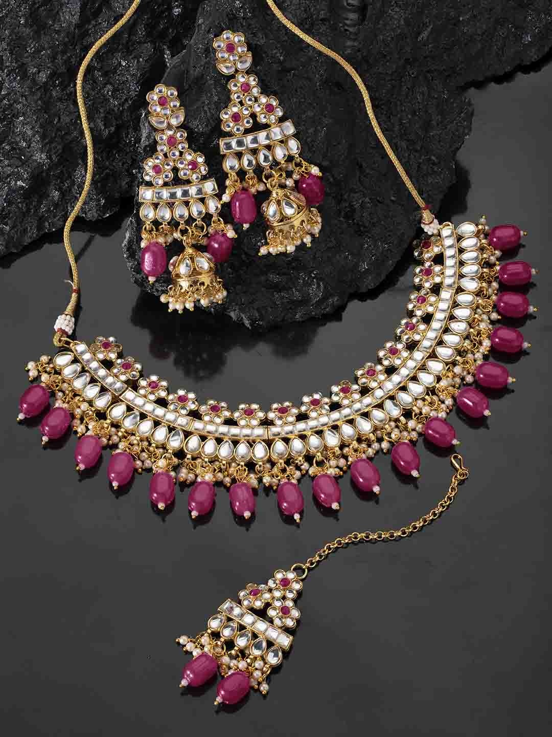 

Peora Gold-Plated Red Kundan Studded Jewellery Set