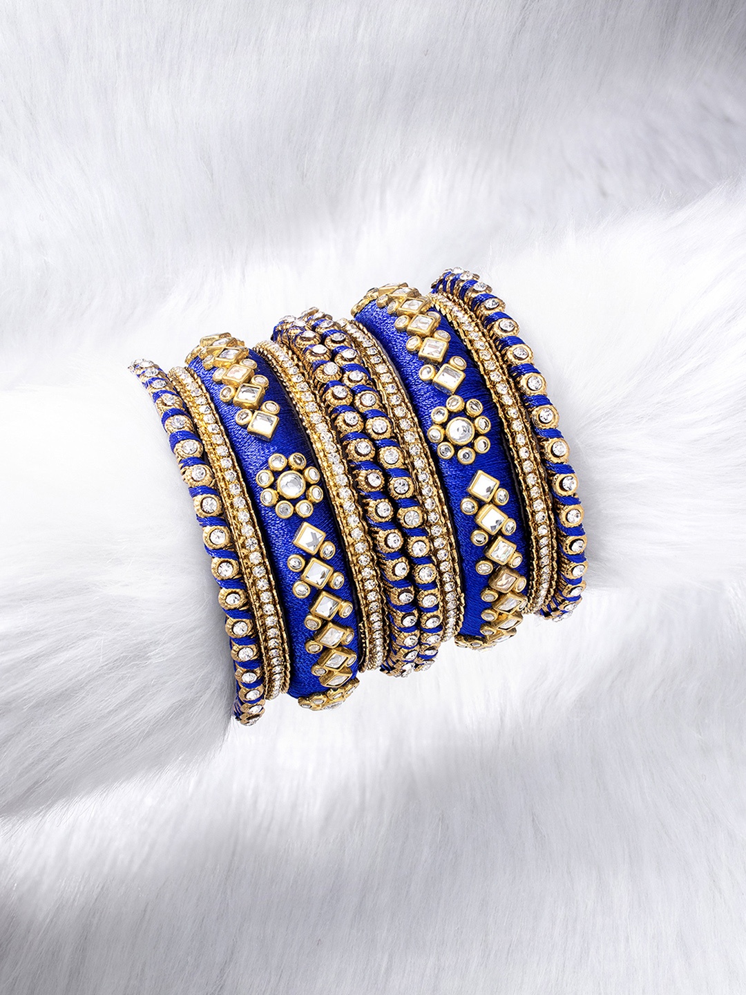 

Peora Set Of 10 Blue Gold-Plated Stone Studded Silk Thread Bangles