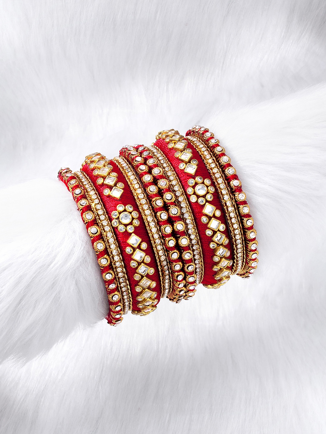 

Peora Set Of 10 Red Gold-Plated Stone Studded Silk Thread Bangle