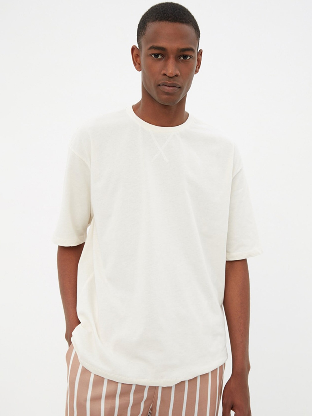 

Trendyol Men Off White Solid Pure Cotton T-shirt