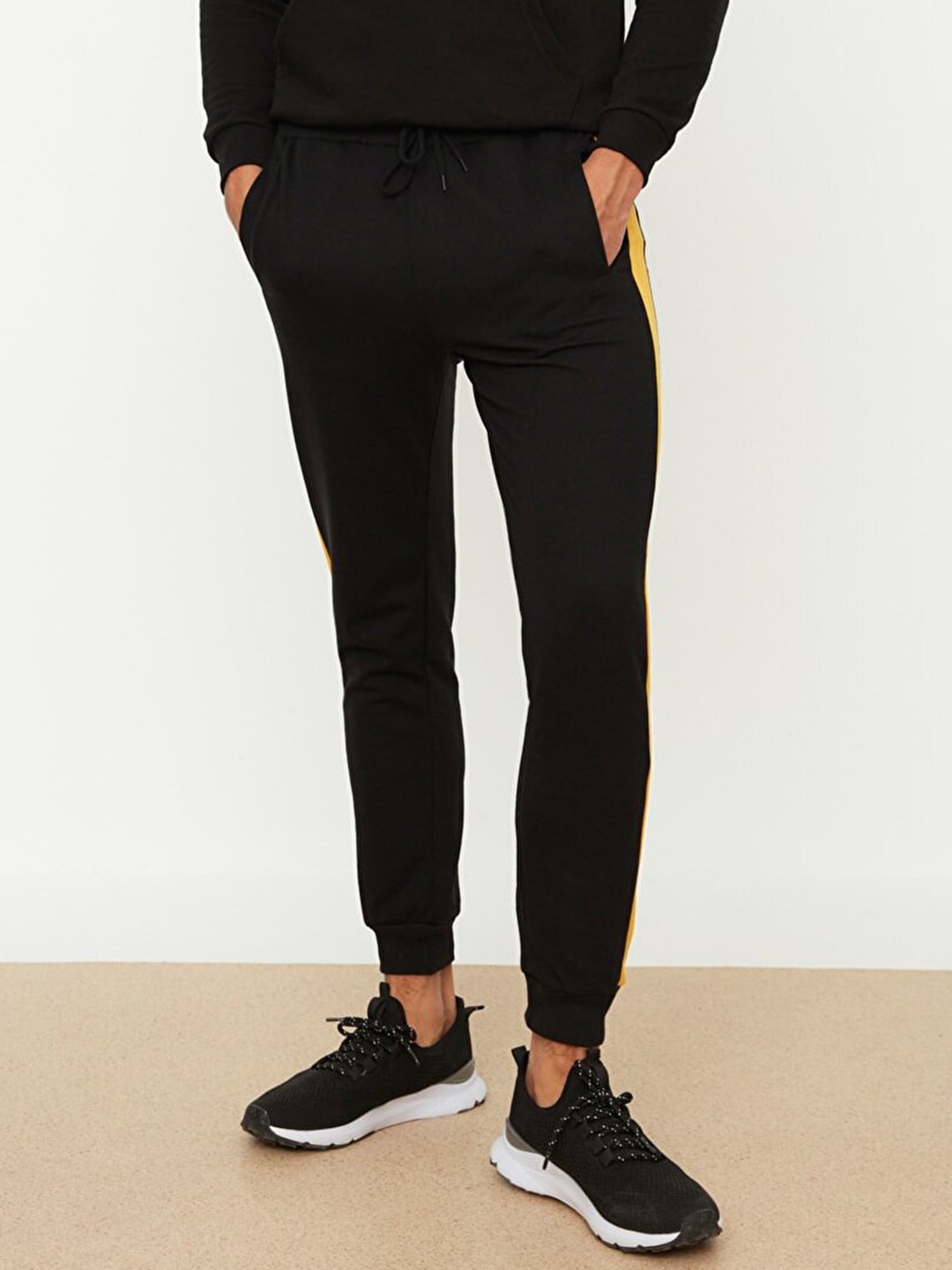 

Trendyol Men Black & Yellow Solid Joggers