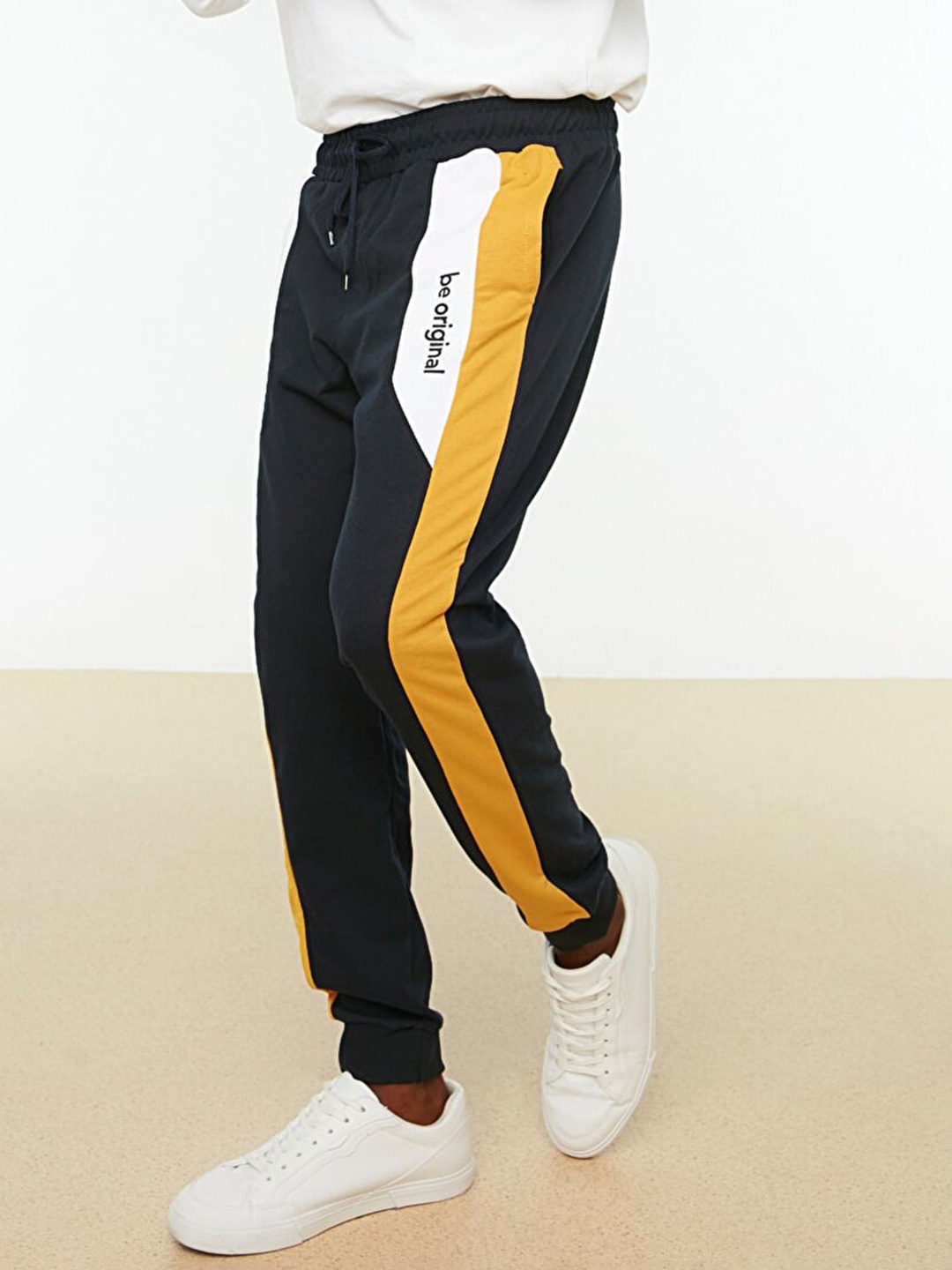 

Trendyol Men Navy Blue & Yellow Striped Joggers