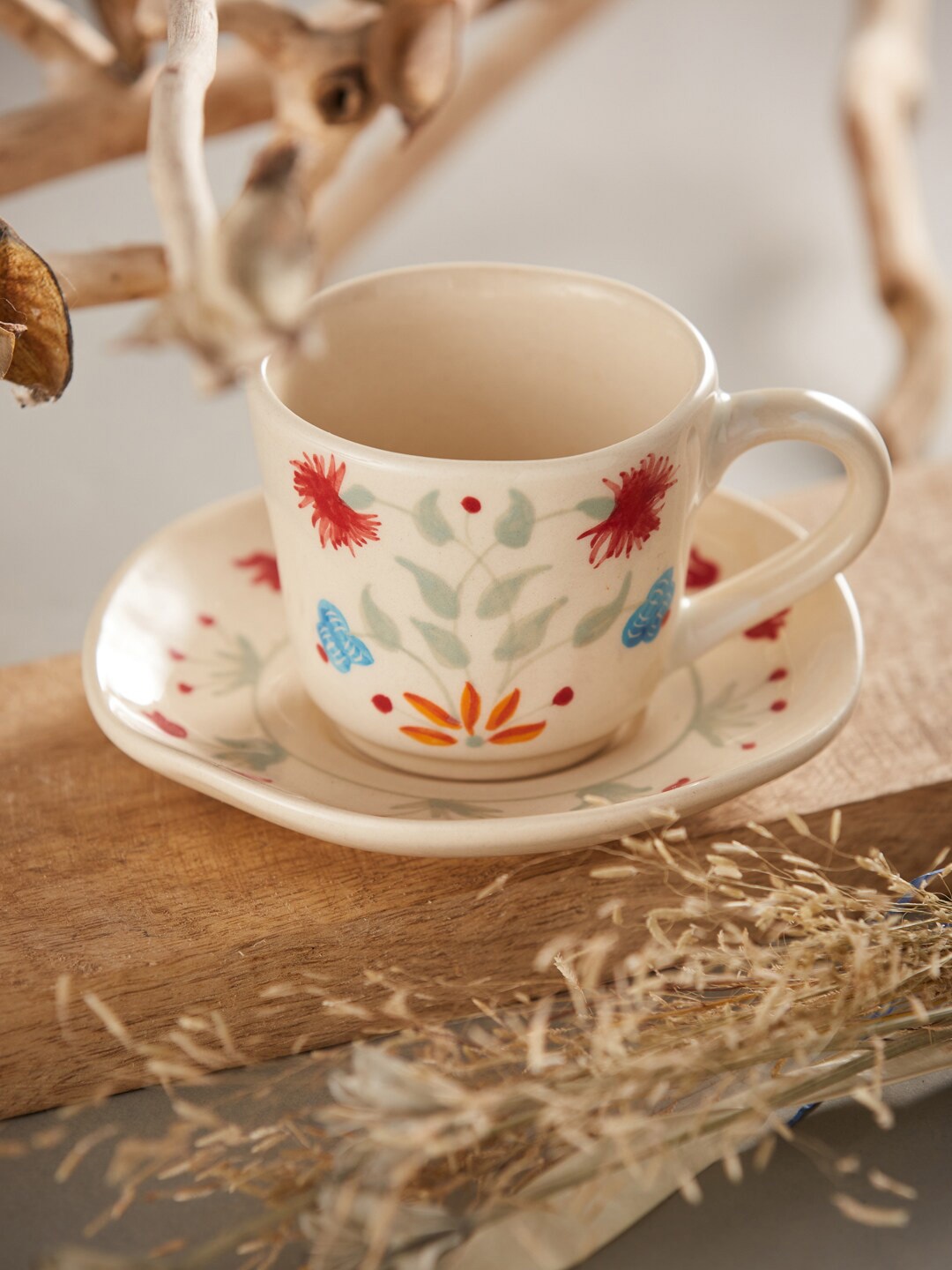 

Fabindia Cream-Coloured & Red 4pc Floral Printed Ceramic Glossy Cups and Saucers