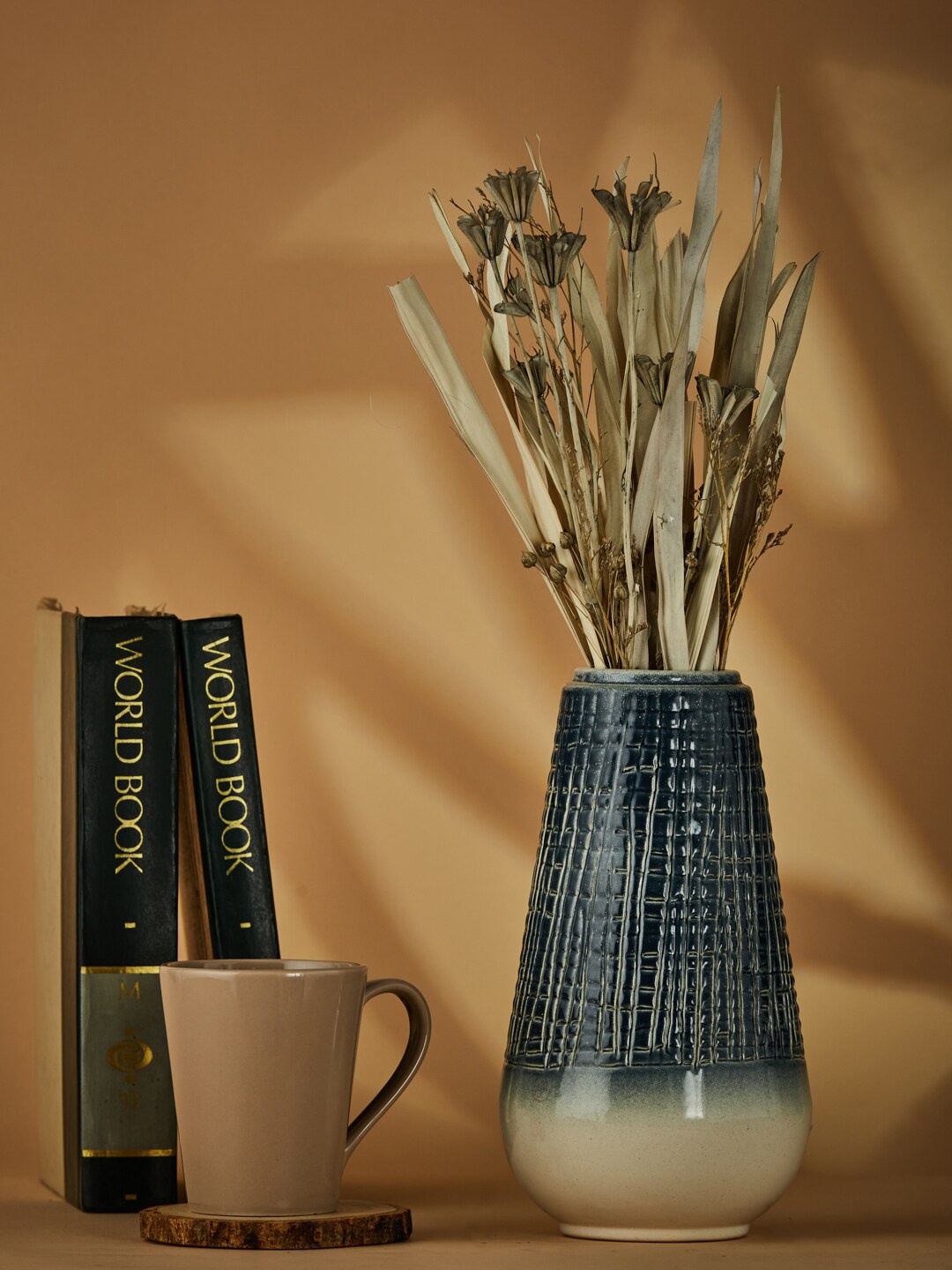 

Fabindia Blue Textured Adhvara Etched Ombre Vase