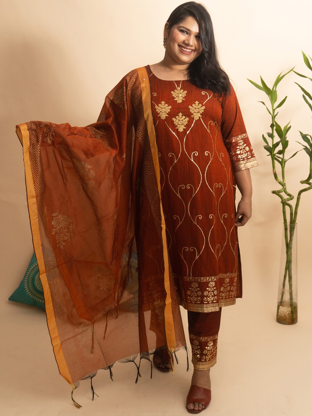

Bani Women Plus Size Brown Ethnic Motifs Printed Liva Kurta With Trousers & Dupatta