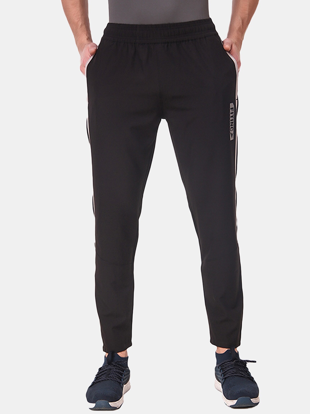 

FITINC Men Black Solid Relaxed-Fit Light Weight Track Pant with Zipper Pockets