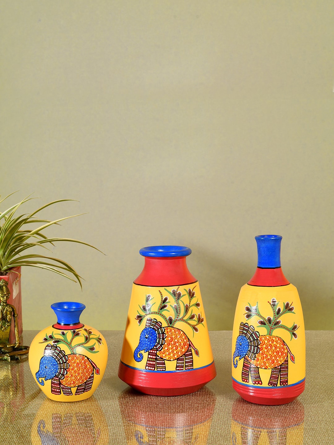 

AAKRITI ART CREATIONS Set Of 3 Yellow Joyful Elephants Terracotta Vase