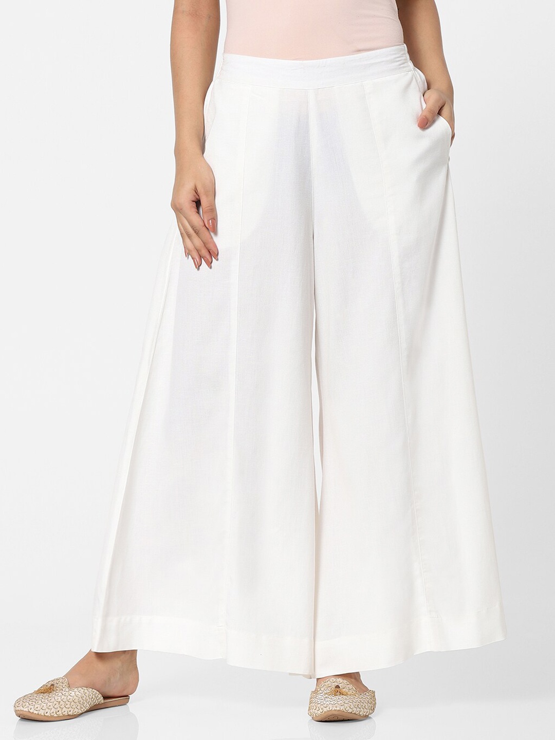 

Naari Women Off White Solid Flared Palazzos