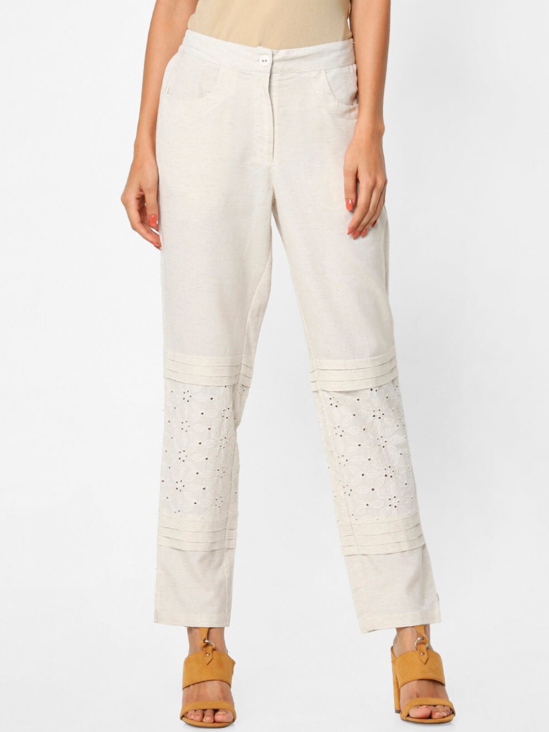 

Naari Women White Textured Straight Fit Trousers