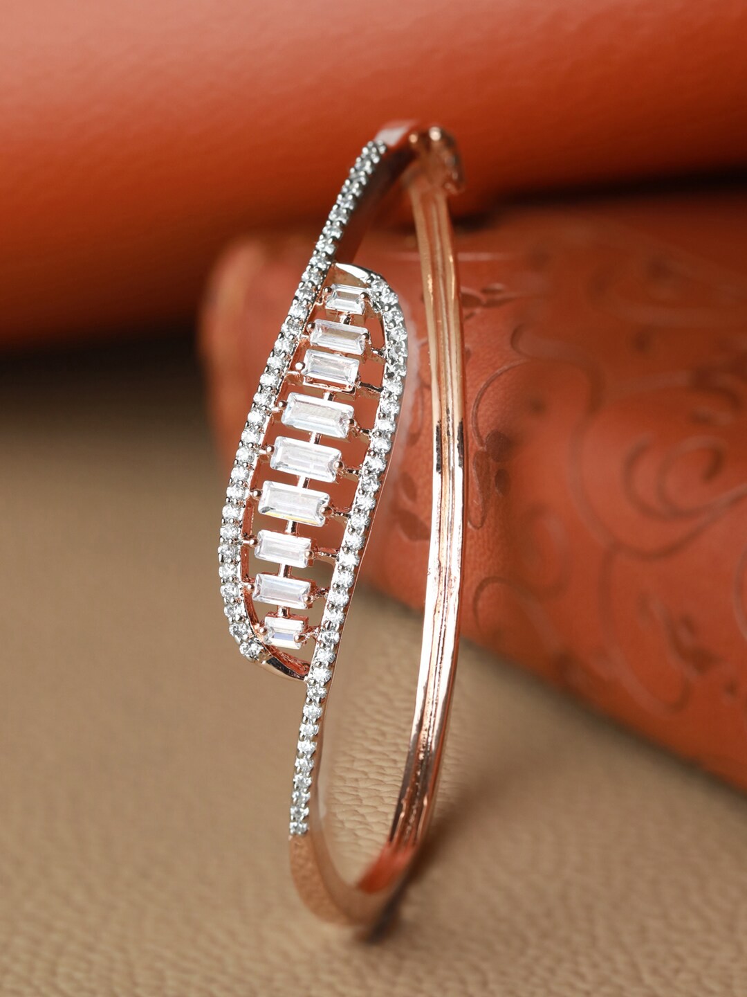 

Priyaasi Women Rose Gold & White Brass American Diamond Rose Gold-Plated Bangle-Style Bracelet