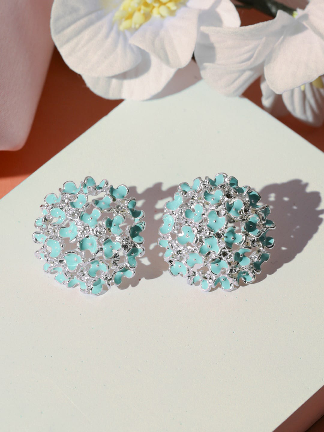 

Priyaasi Silver-Toned & Blue Enamelled Floral Studs Earrings