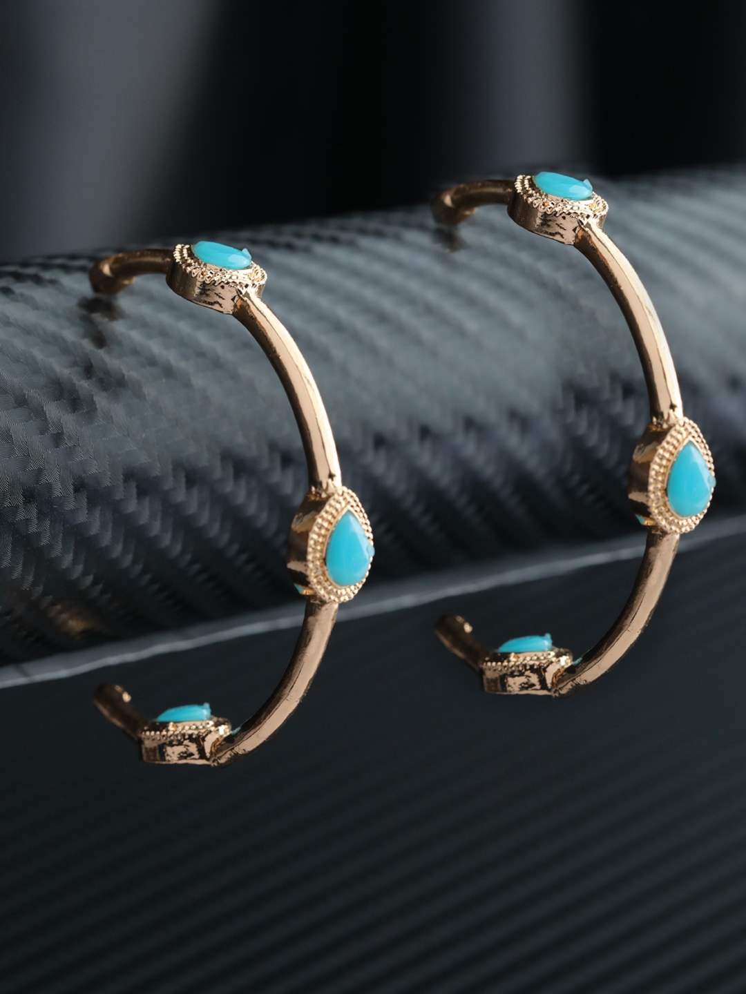 

Priyaasi Rose Gold Stone Studded Half Hoop Earrings