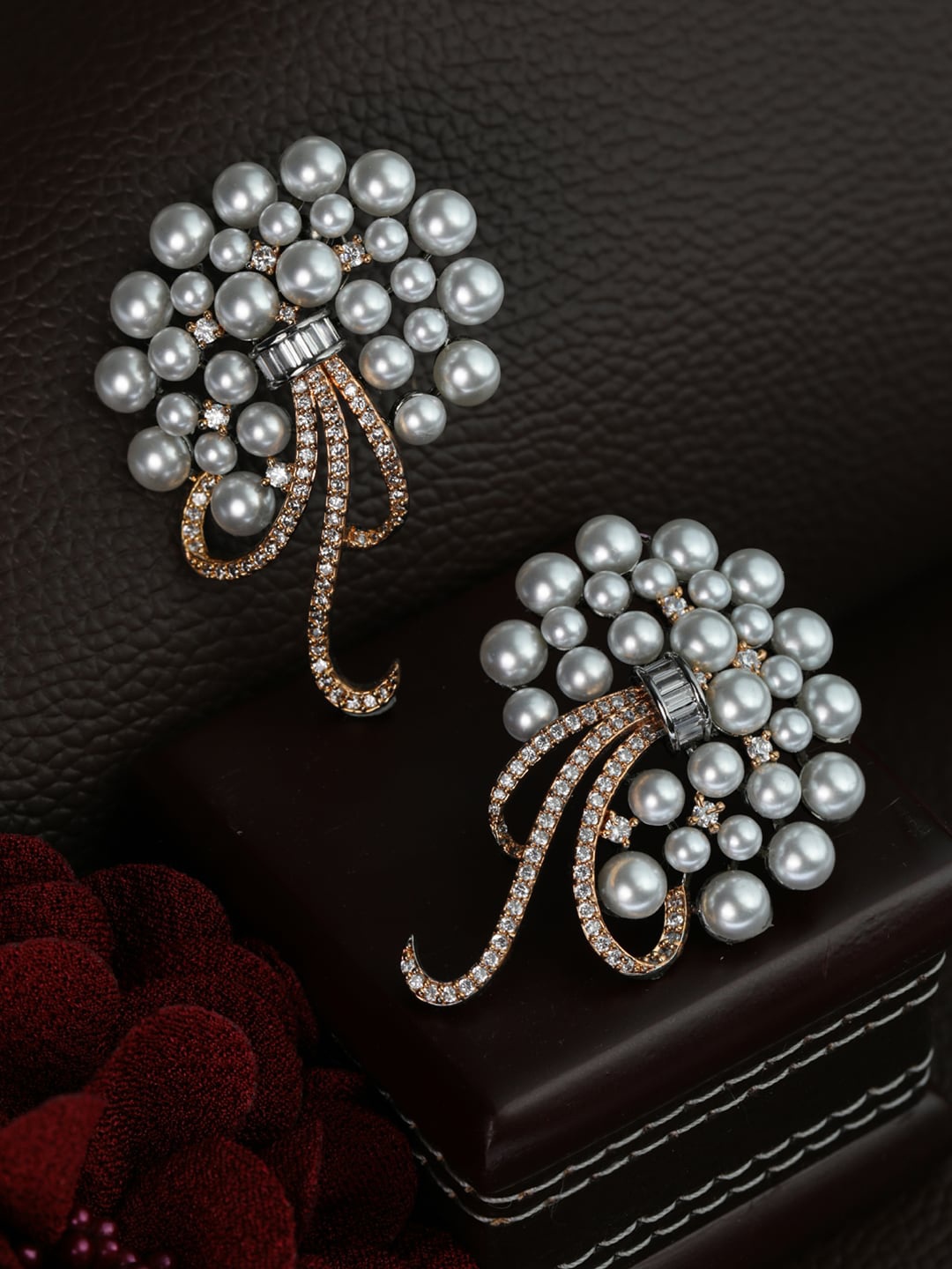 

Priyaasi Silver-Toned Contemporary Studs Earrings