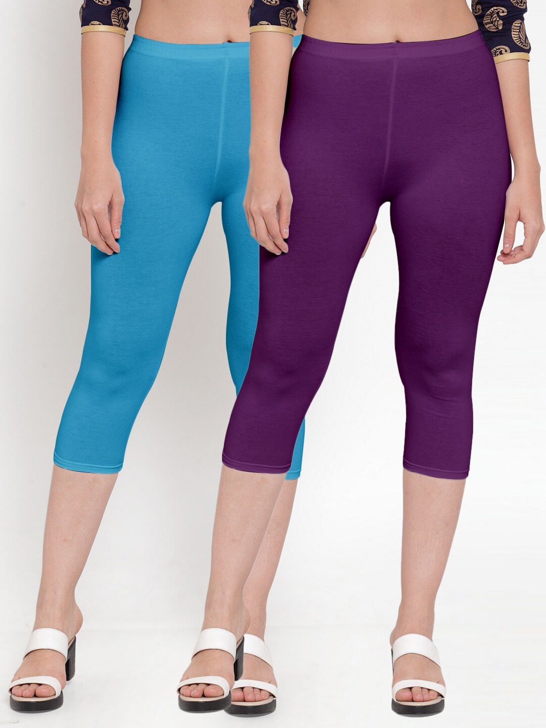 

Jinfo Women Pack Of 2 Purple & Blue Solid Capris