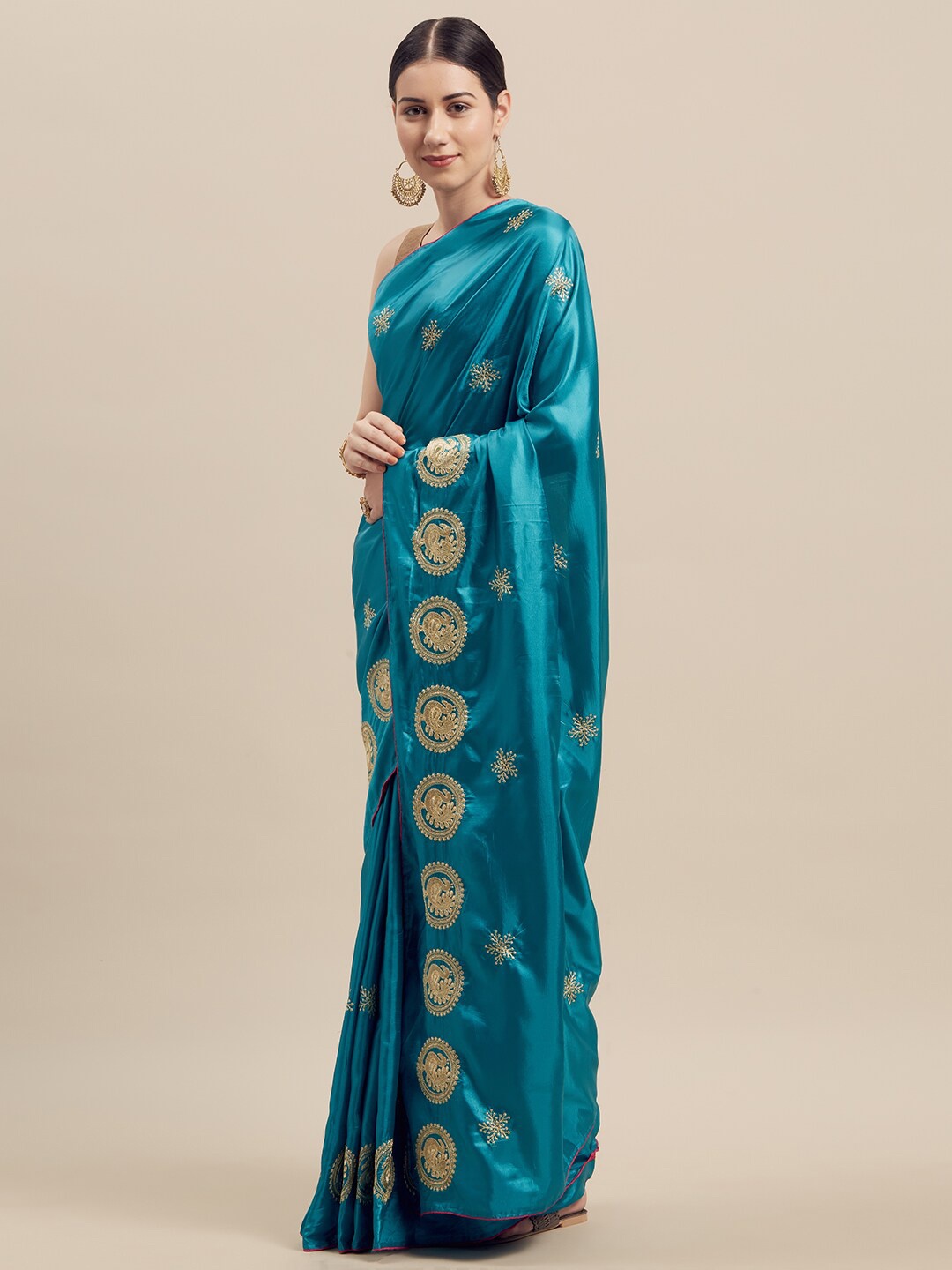 

SAADHVI Teal & Gold-Toned Ethnic Motifs EmbroideredSaree