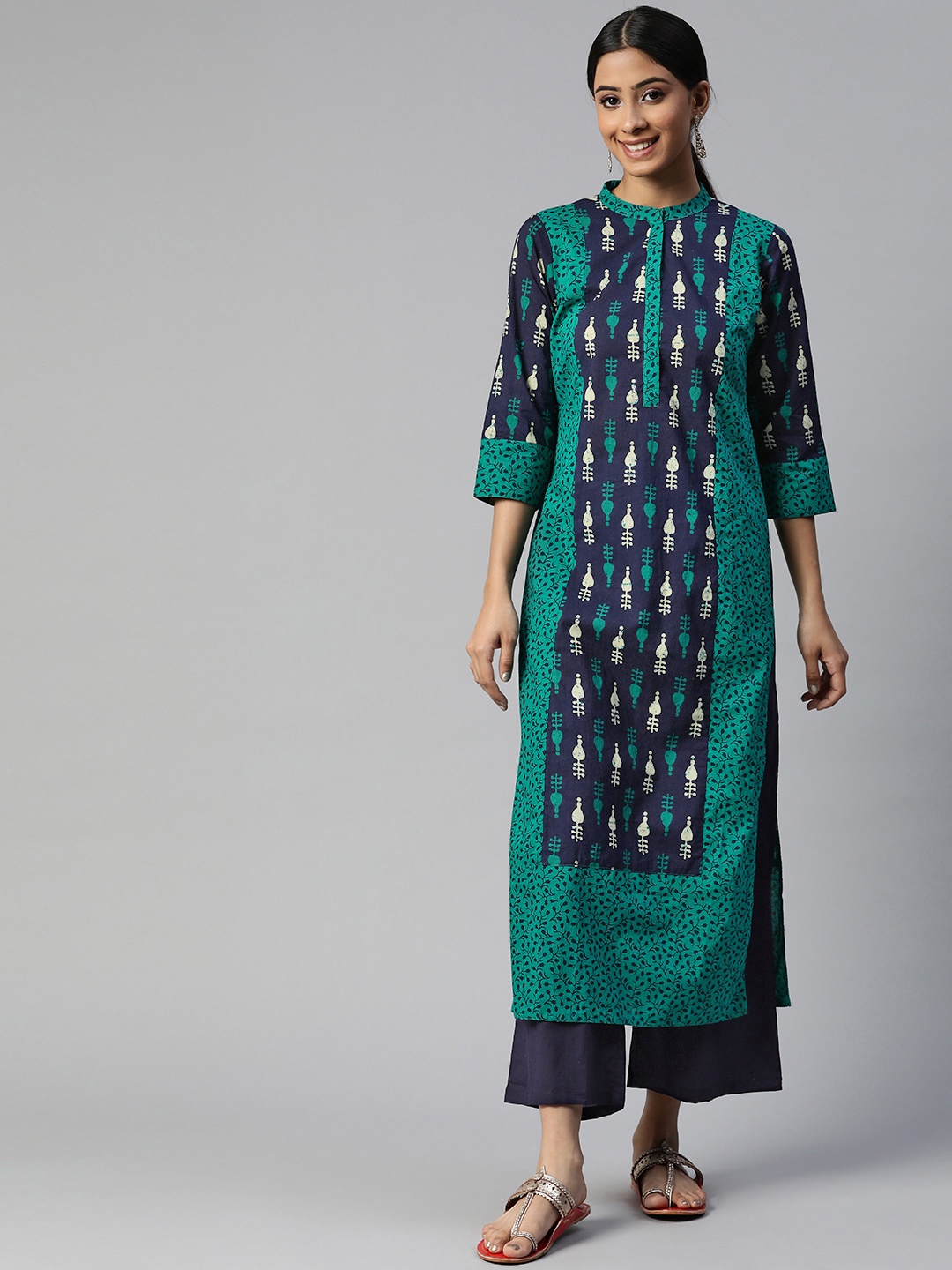 

SVARCHI Women Navy Blue Ethnic Motifs Printed Panelled Pure Cotton Kurta with Palazzos