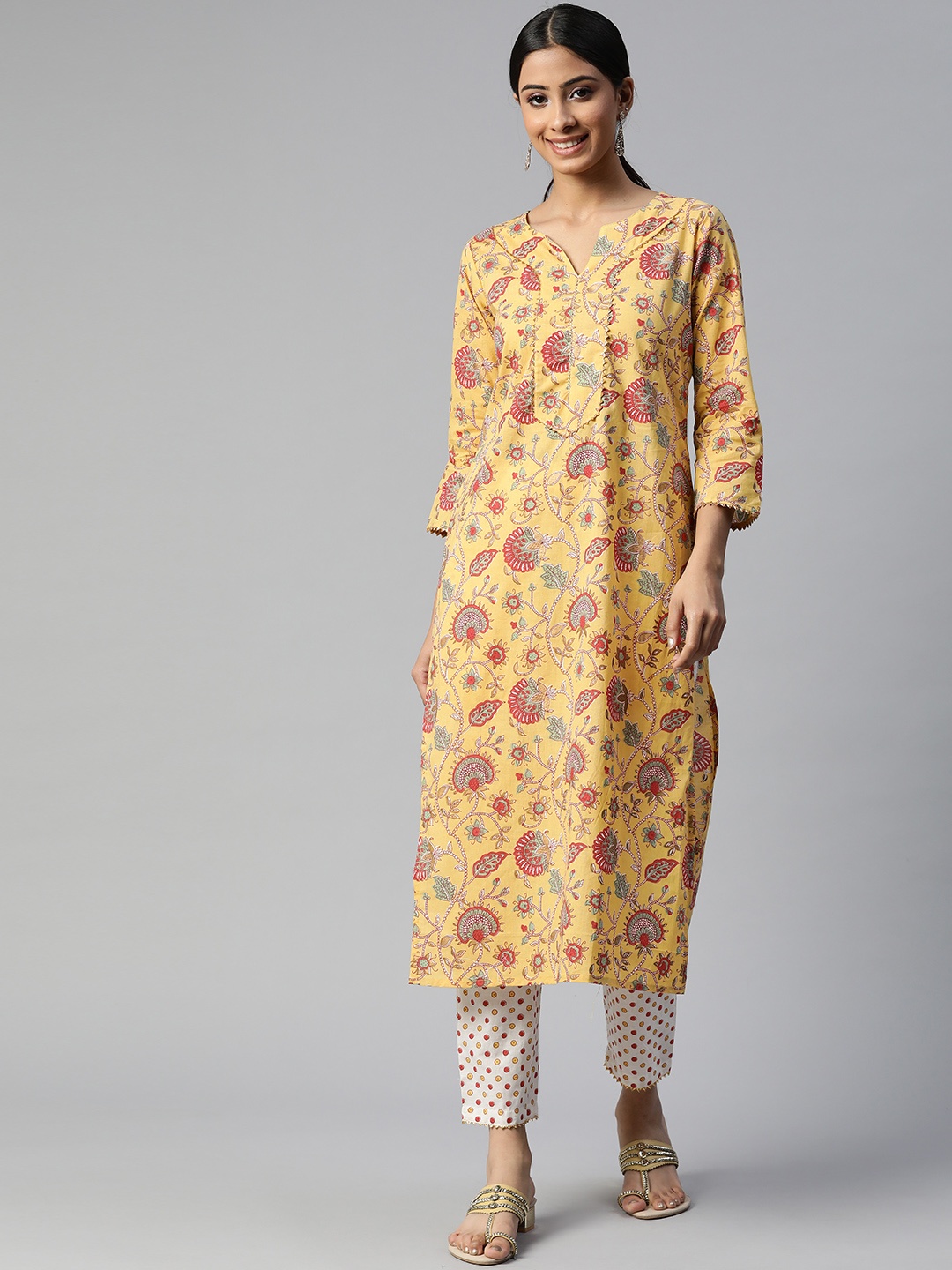 

SVARCHI Women Mustard Yellow & White Ethnic Motifs Printed Pure Cotton Kurta with Trousers