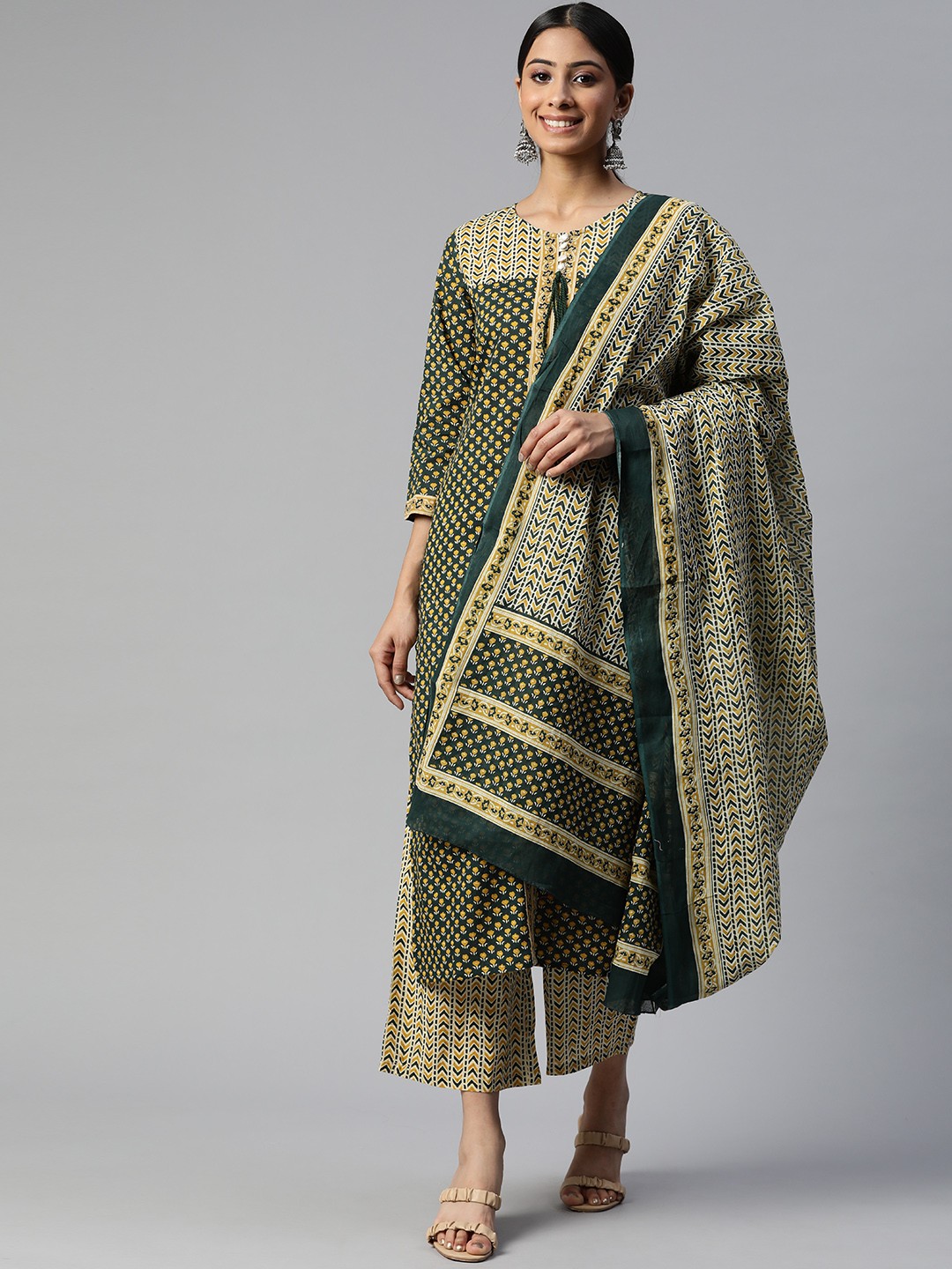 

SVARCHI Women Green Printed Cotton Kurta with Palazzos & With Dupatta