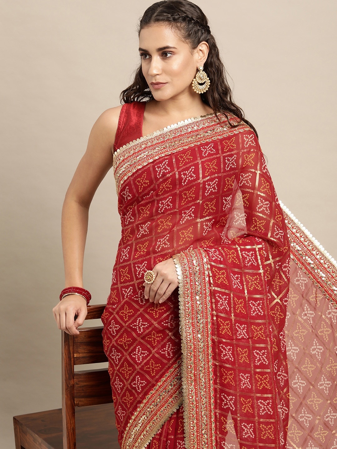 

VASTRANAND Red Sequinned Bandhani Saree