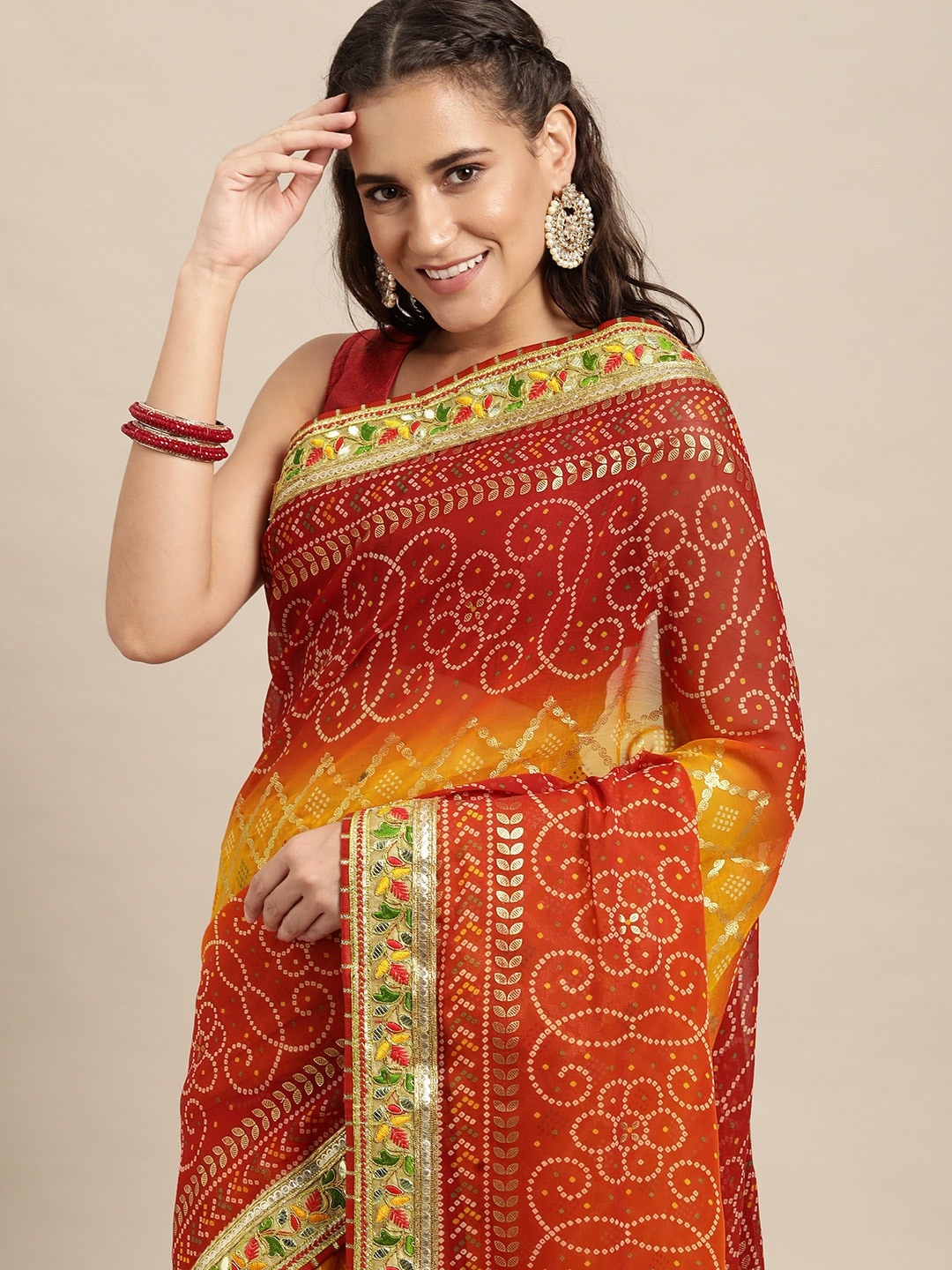 

VASTRANAND Maroon & Yellow Sequinned Bandhani Saree