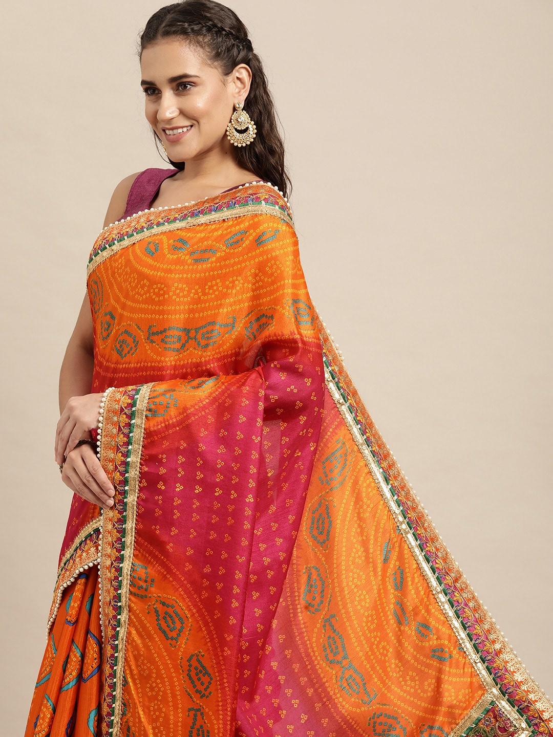 

VASTRANAND Orange & Pink Sequinned Bandhani Saree