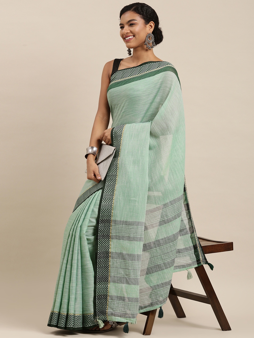 

SANGAM PRINTS Sea Green Solid Pure Linen Saree