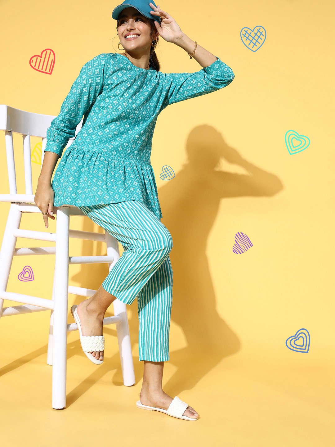 

Prakrti Women Turquoise Blue Printed Top with Striped Trousers