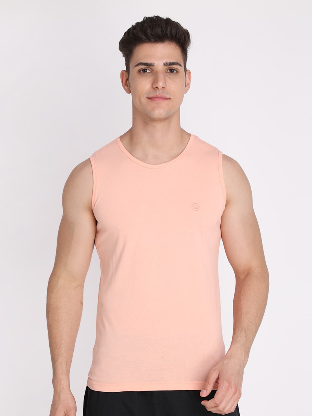 

Chkokko Men Peach-Coloured Solid Sleeveless Cotton T-shirt