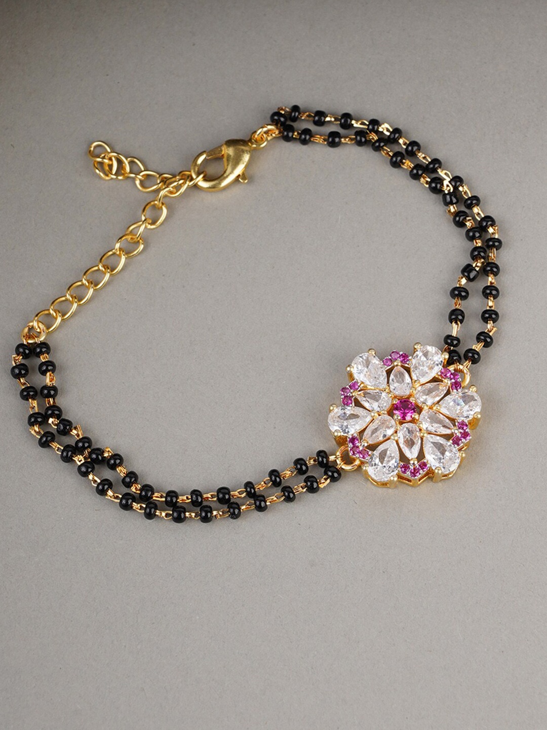 

Voylla Women Gold-Toned & Black Brass Enamelled Gold-Plated Charm Bracelet