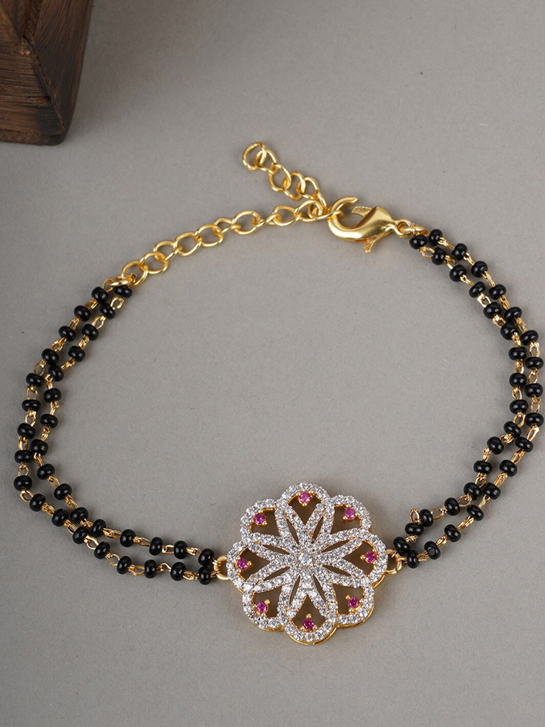 

Voylla Black Gold-Plated American Diamond CZ Flower Shaped Mangalsutra Bracelet