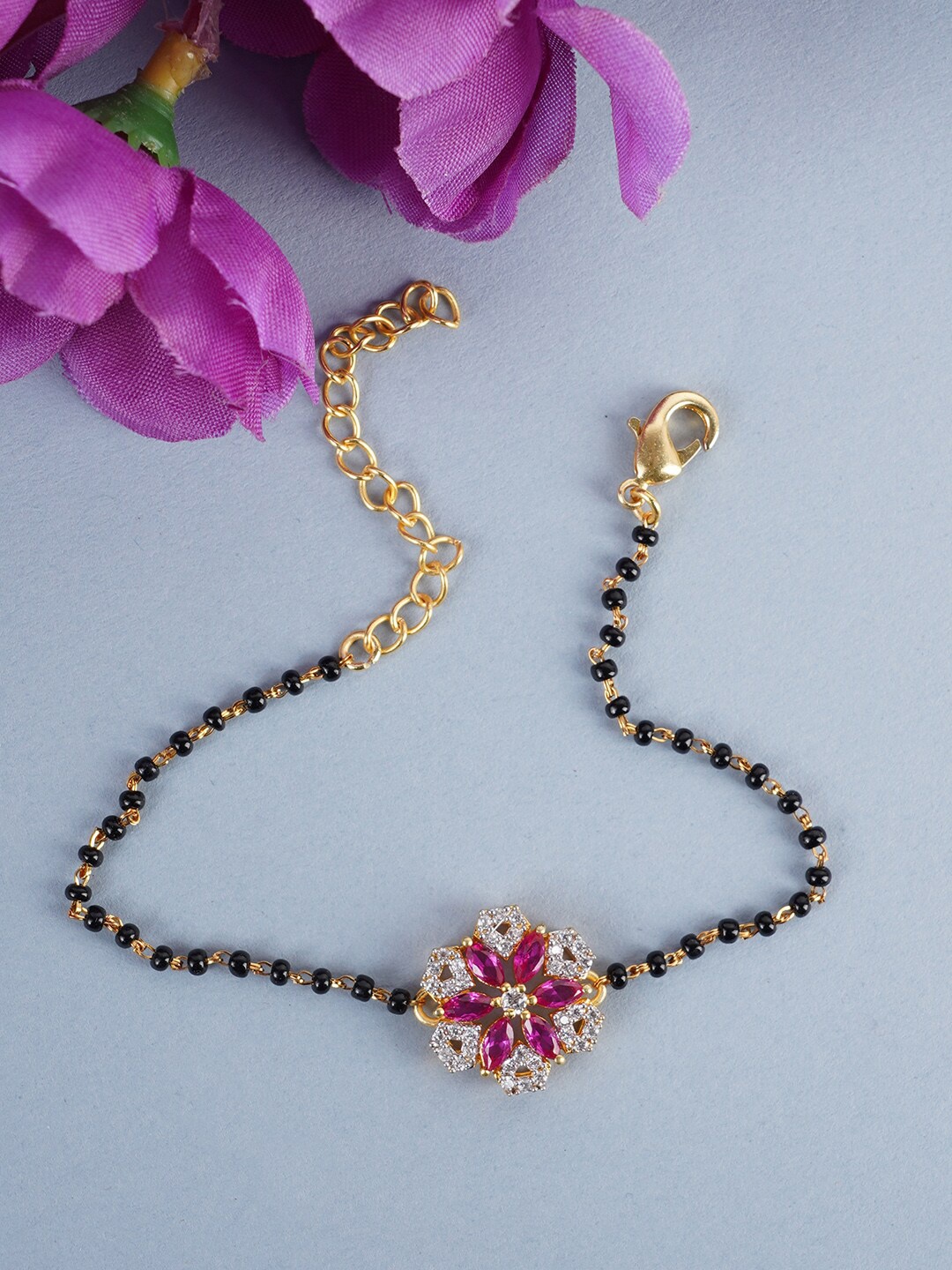 

Voylla Women Gold-Plated & Black Cubic Zirconia Charm Bracelet