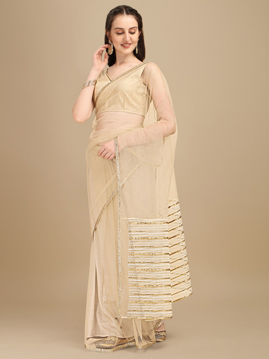 

Sangria Beige Sequinned Net Saree