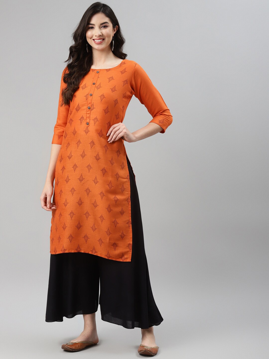 

Aarika Women Orange Ethnic Motifs Cotton Printed Straight Kurta