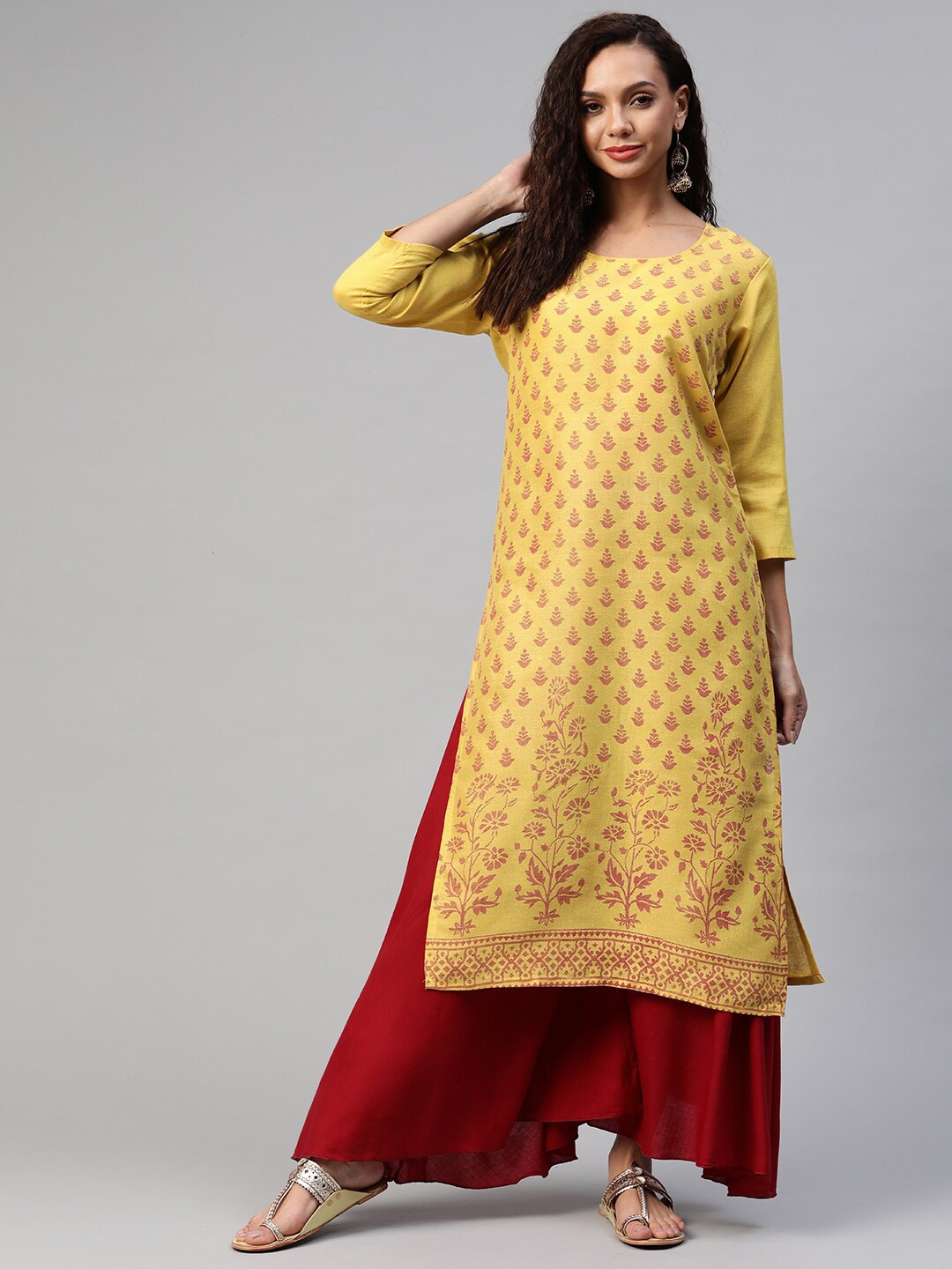 

Aarika Women Yellow & Maroon Ethnic Motifs Cotton Printed Straight Kurta