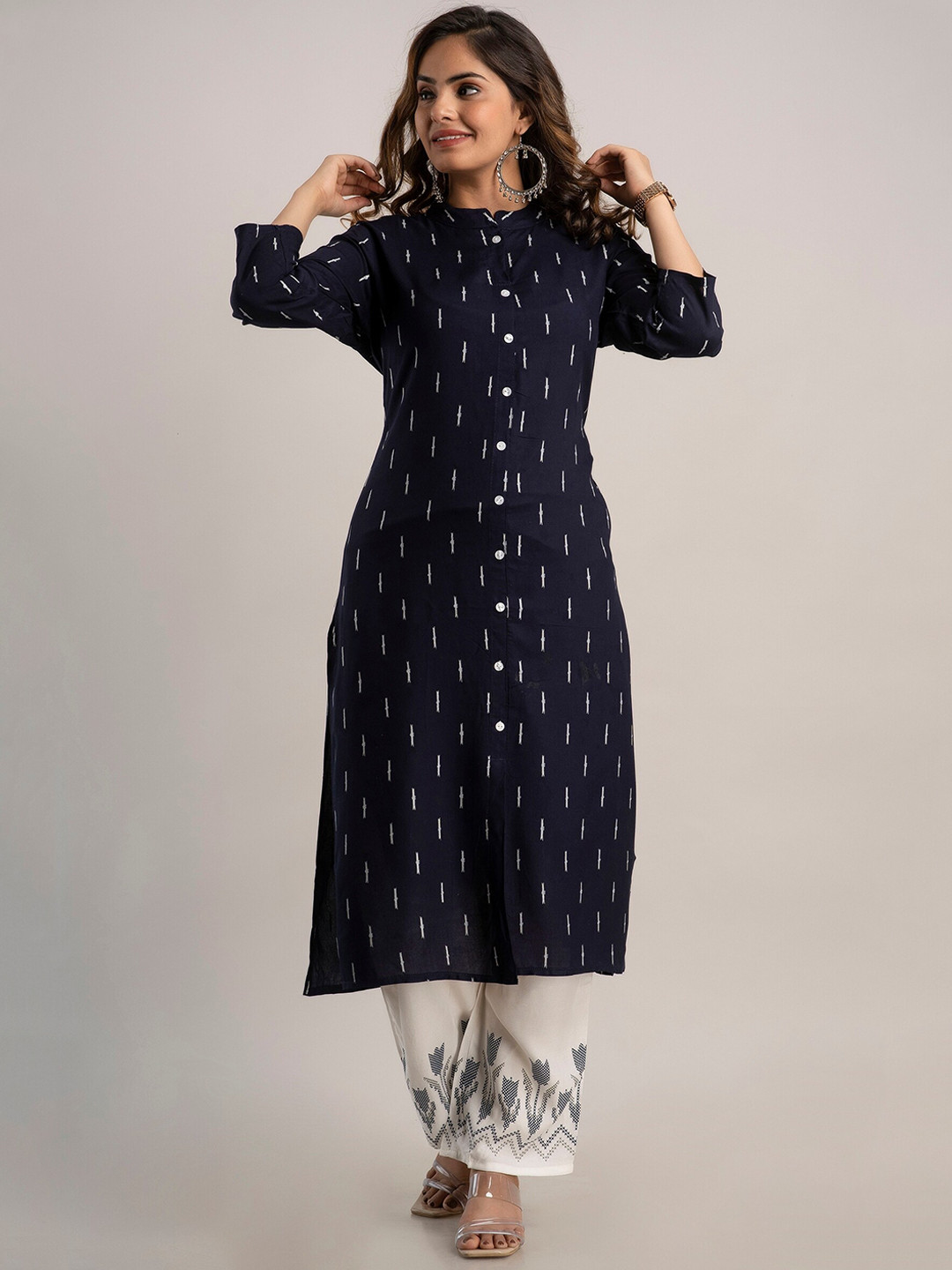

OMASK Women Blue Printed Panelled Kurta with Palazzos