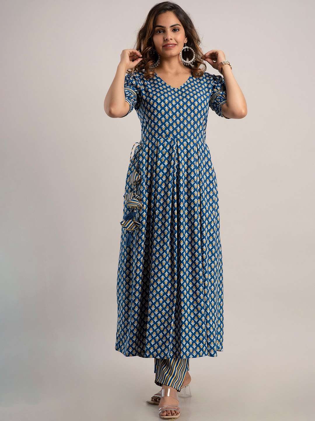 

OMASK Women Blue Printed High Slit Kurta with Trousers